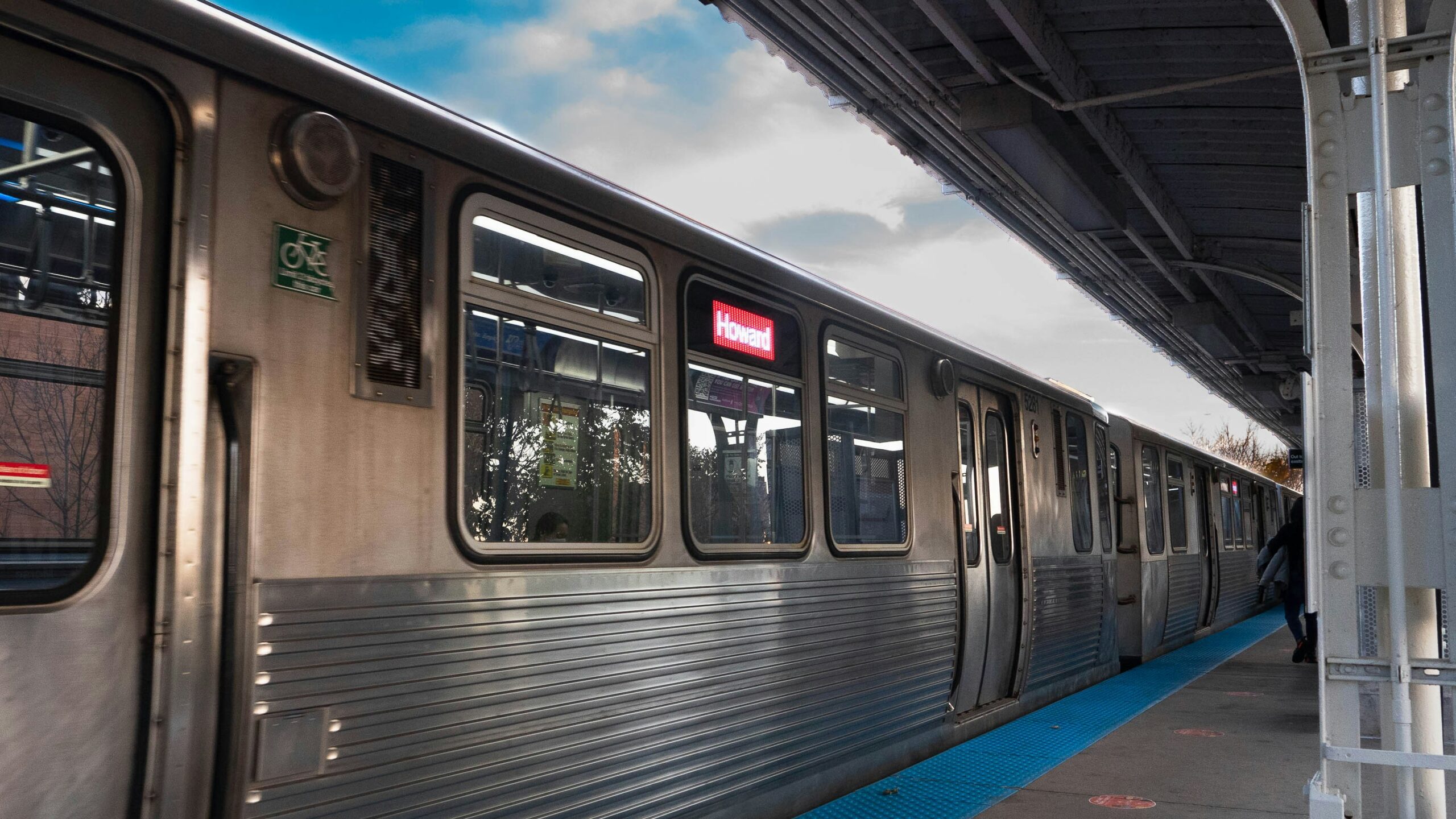CTA Howard-bound red line L train car waiting at a station