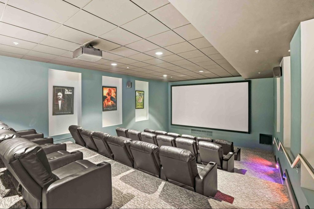 The theater movie room at Alta at K Station apartments in Chicago's South Loop