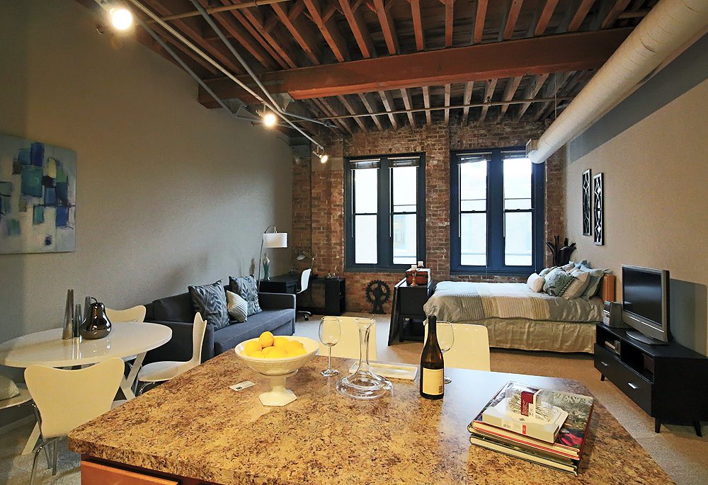Studio apartment at Cobbler Square with an industrial feel.